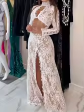 White long-sleeve lace maxi dress with a high slit